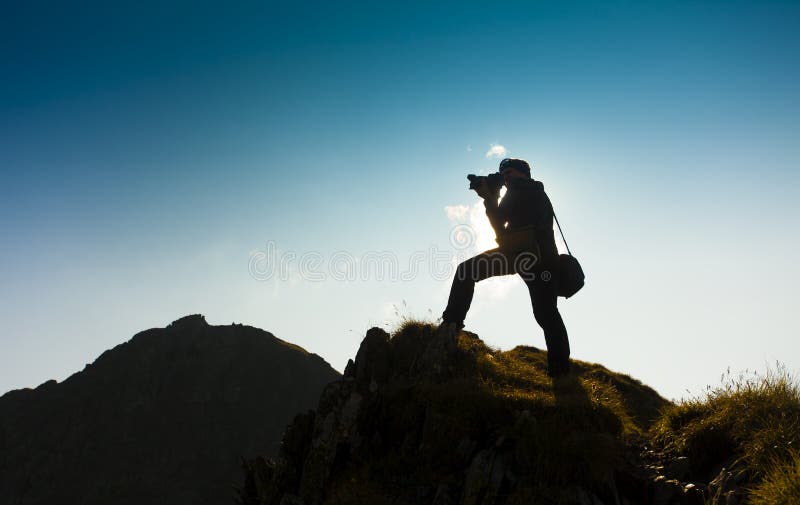 Man photogrpher taking photos in nature stock images Man photogrpher taking photos in nature stock images