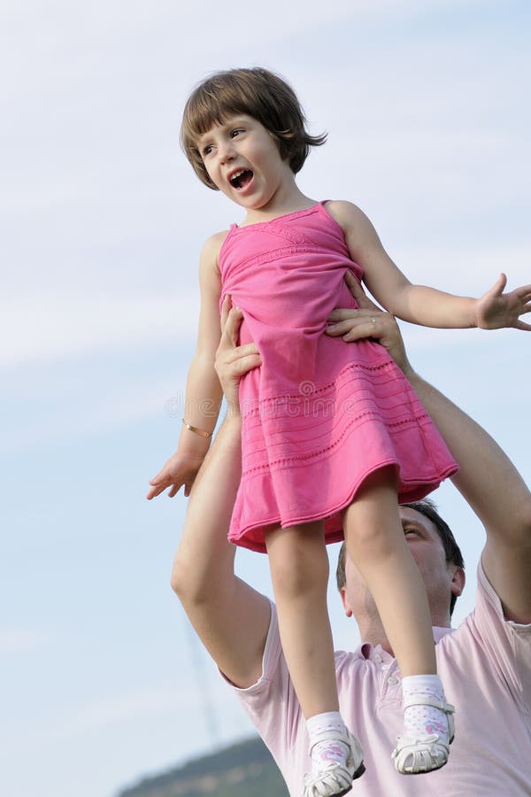 Man picking up girl royalty free stock photography