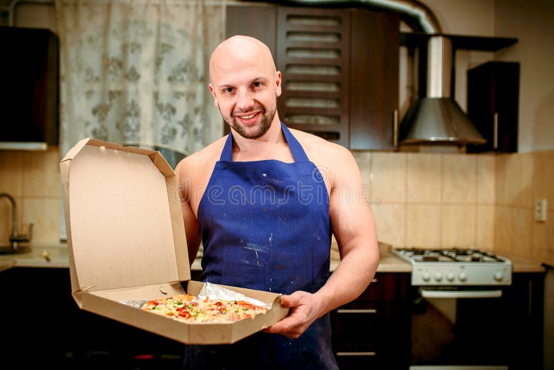 Man with pizza stock image. Image of knife, breakfast 112128183
