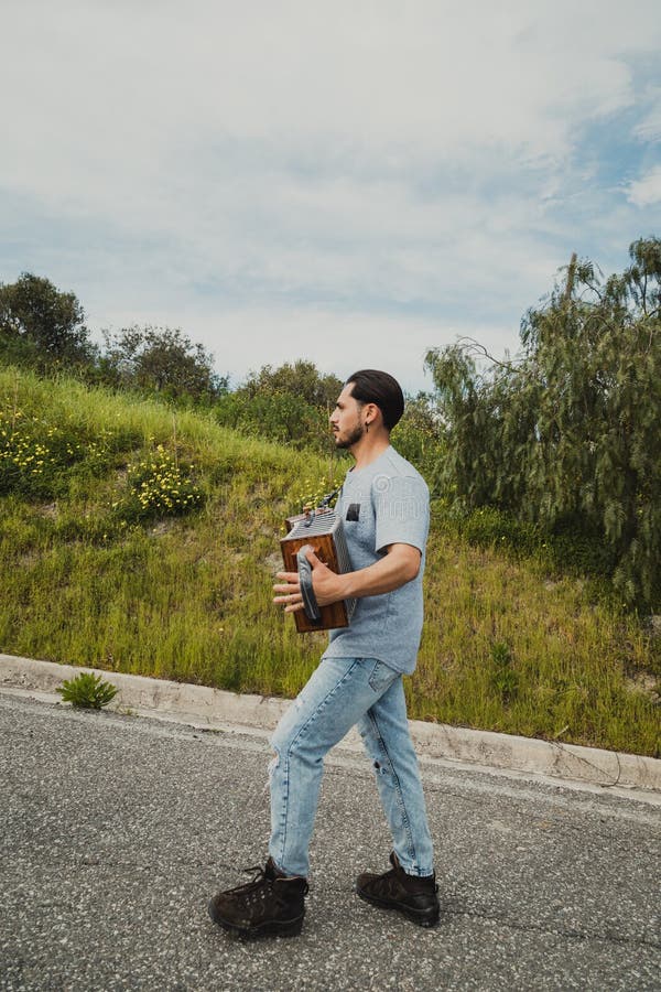 Sunny Day Over The Man Playing Accordion royalty free stock photo