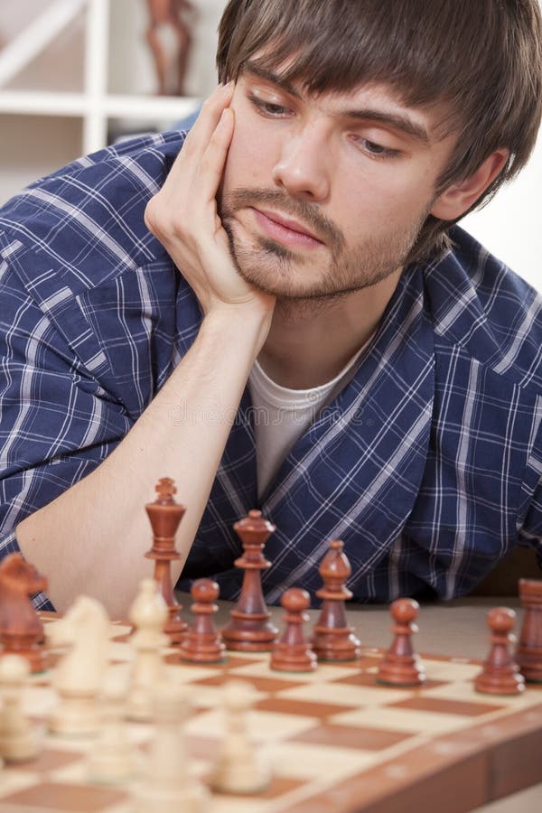 Man Playing Chess Against Himself Shot In The Studio Stock Photo, Picture  and Royalty Free Image. Image 30682890.