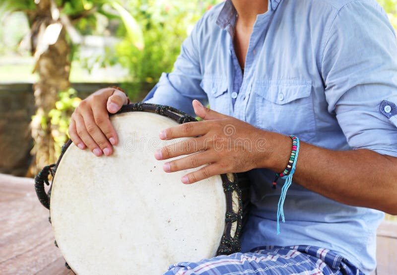 Djembe player stock image. Image of peaceful, holding 19762979