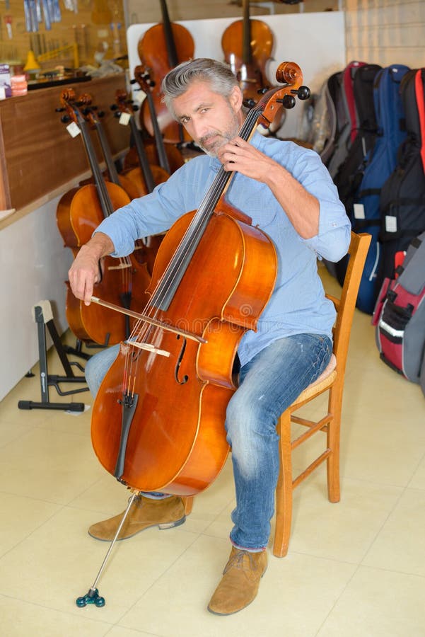 Man playing double bass stock photo. Image of musical 120356938