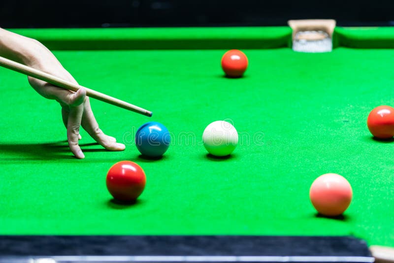 A Man Playing Snooker in Bar. Snooker Player Aiming Snooker Ball on