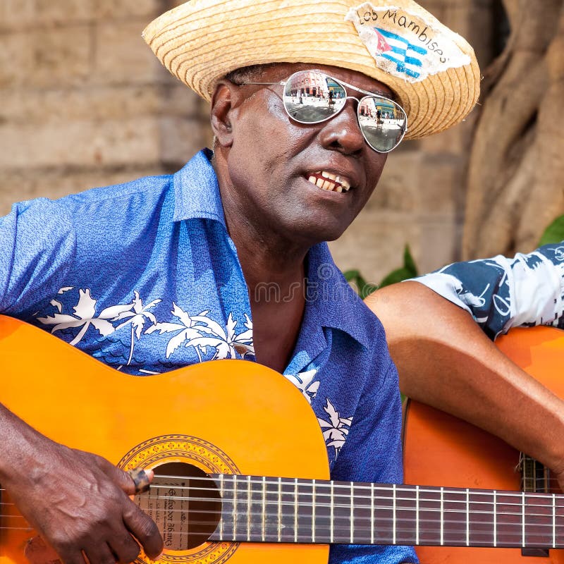 Man playing traditional music in Old Havana stock photography Man playing traditional music in Old Havana stock photography