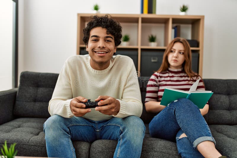 Couple playing games stock image. Image of girlfriend - 132760653