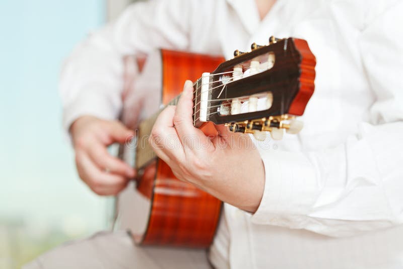 Man Plays on Classical Acoustic Guitar Stock Photo Image of guitar