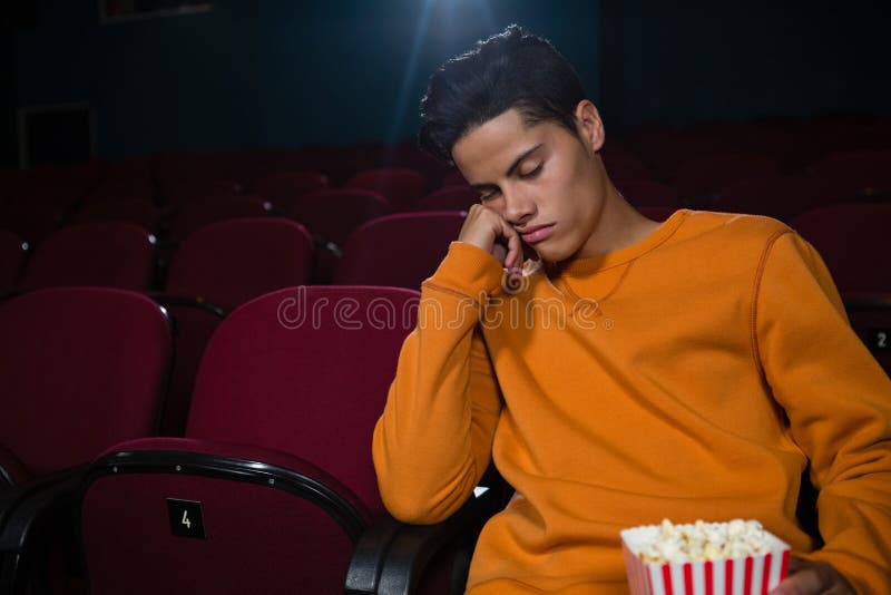Man with Popcorn Sleeping in Theatre Stock Image Image of handsome