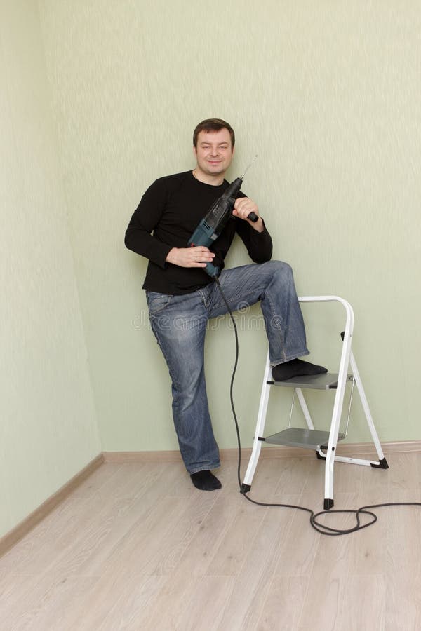 Man poses with perforator