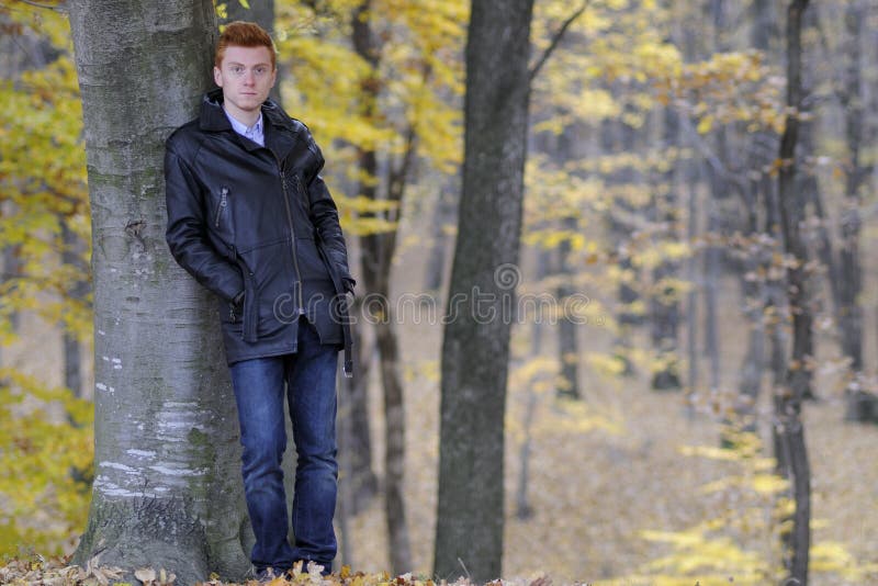 Man posing in fall season