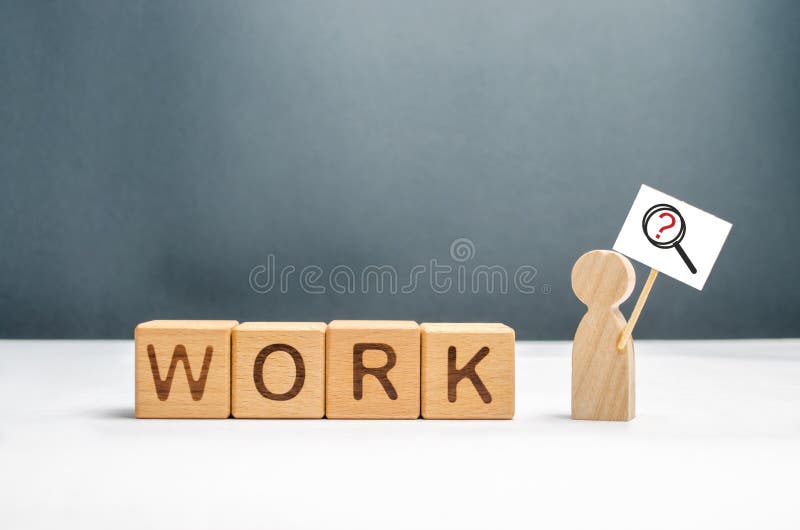 Man with a poster and a magnifying glass near the cubes with the word work. Man in search of work or part-time job. Headhunters stock images Man with a poster and a magnifying glass near the cubes with the word work. Man in search of work or part-time job. Headhunters stock images