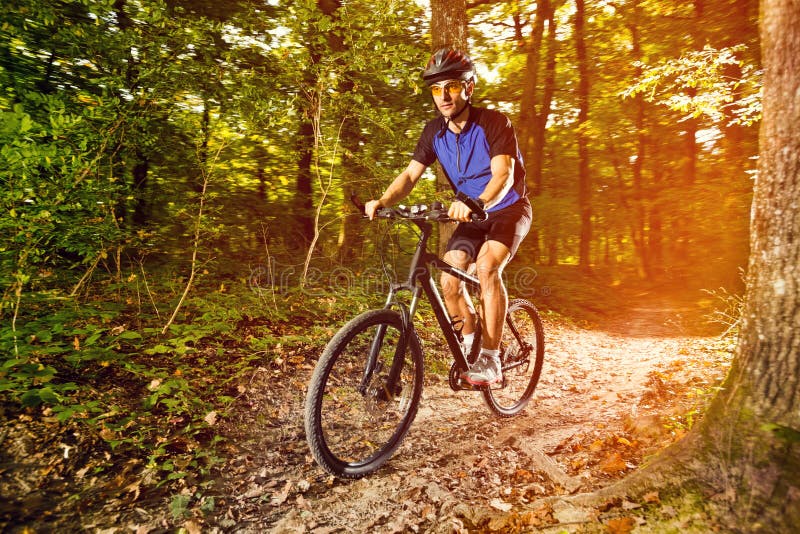 Mountain biking man stock image. Image of leisure, cycling 10619659