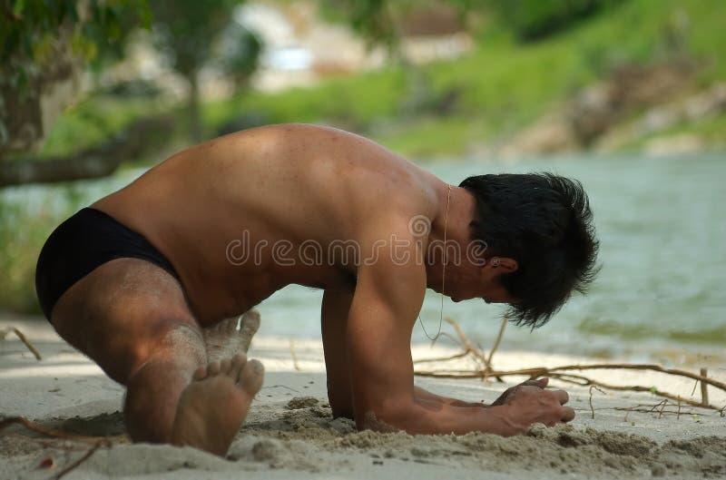Man practicing yoga outdoors royalty free stock image Man practicing yoga outdoors royalty free stock image