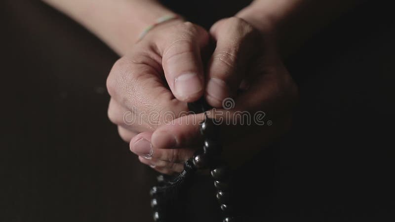 Man Praying With Rosary stock video. Video of color, forgiveness - 90446759