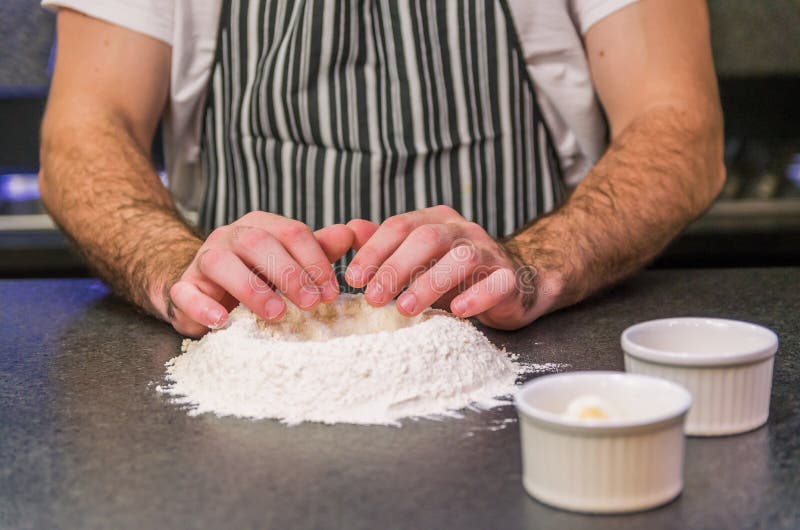 Man Preparing Pizza Dough on Black Granite Table Stock Image Image of