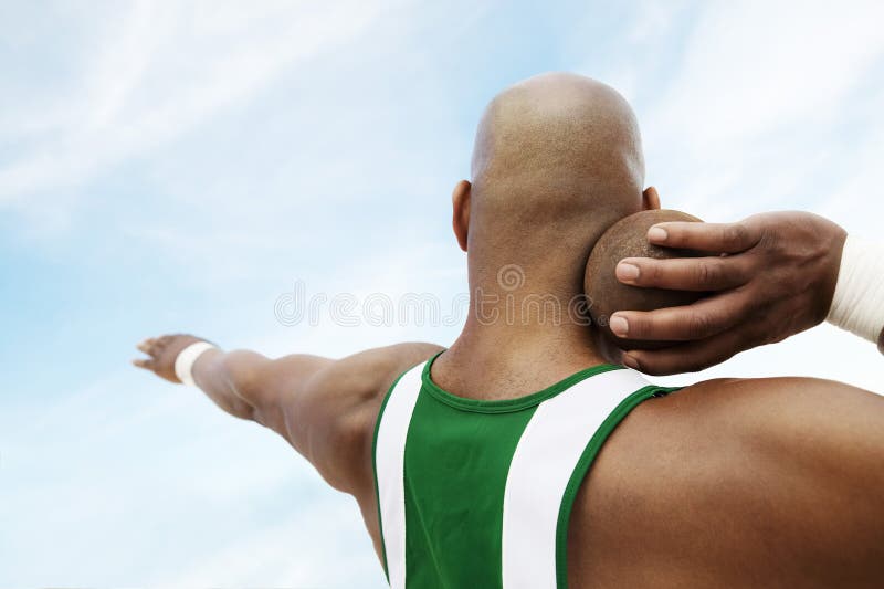 Man Preparing To Toss Shot Put