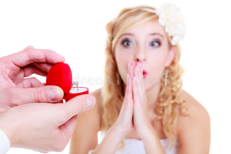 Man proposes to shocked woman stock photography Man proposes to shocked woman stock photography