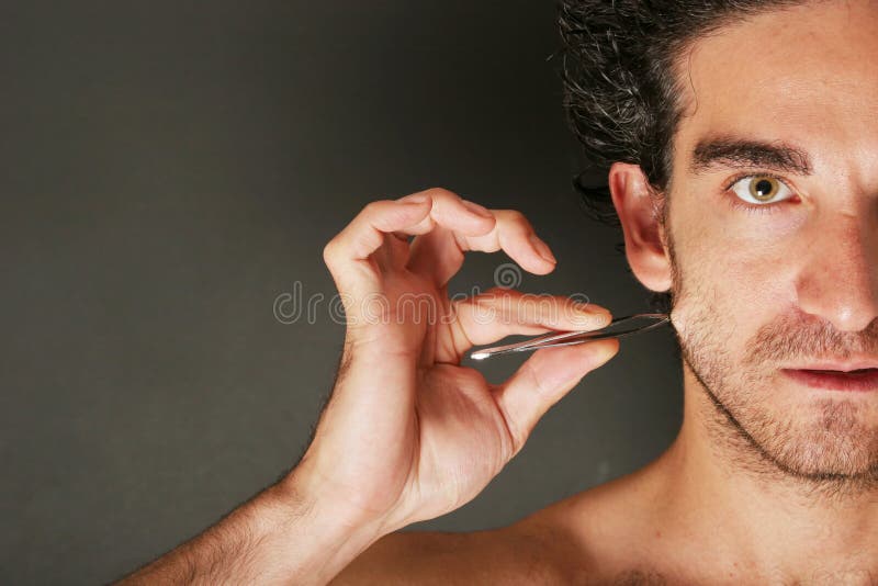 Man pulling his beard stock image. Image of hurting, power 2373051