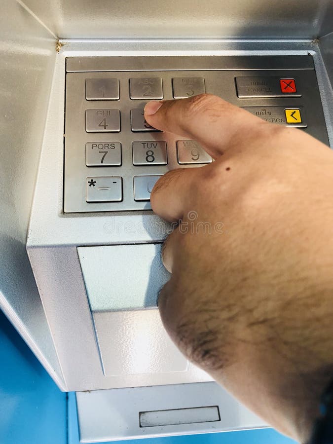 Man withdrew money by atm machine stock image