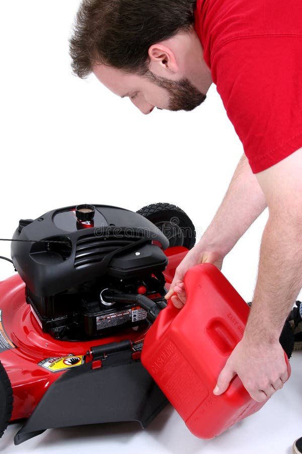 Man Putting Gas into Lawn Mower Over White Stock Photo Image of