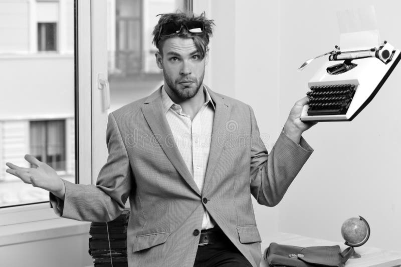 Man with Puzzled Face Types Business Report. Young Author or Editor Holds  Old Typewriter on Window Background Stock Image - Image of editing,  puzzled: 122786293