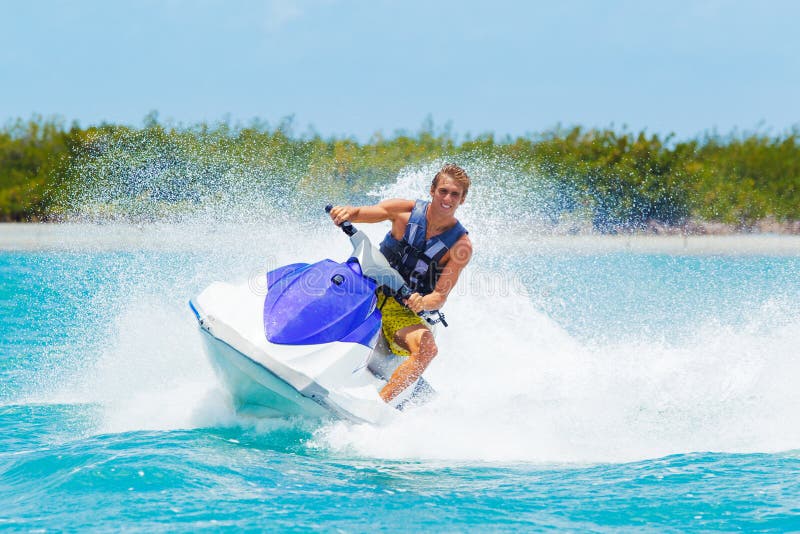 Man på Jet Ski arkivfoton Man på Jet Ski arkivfoton