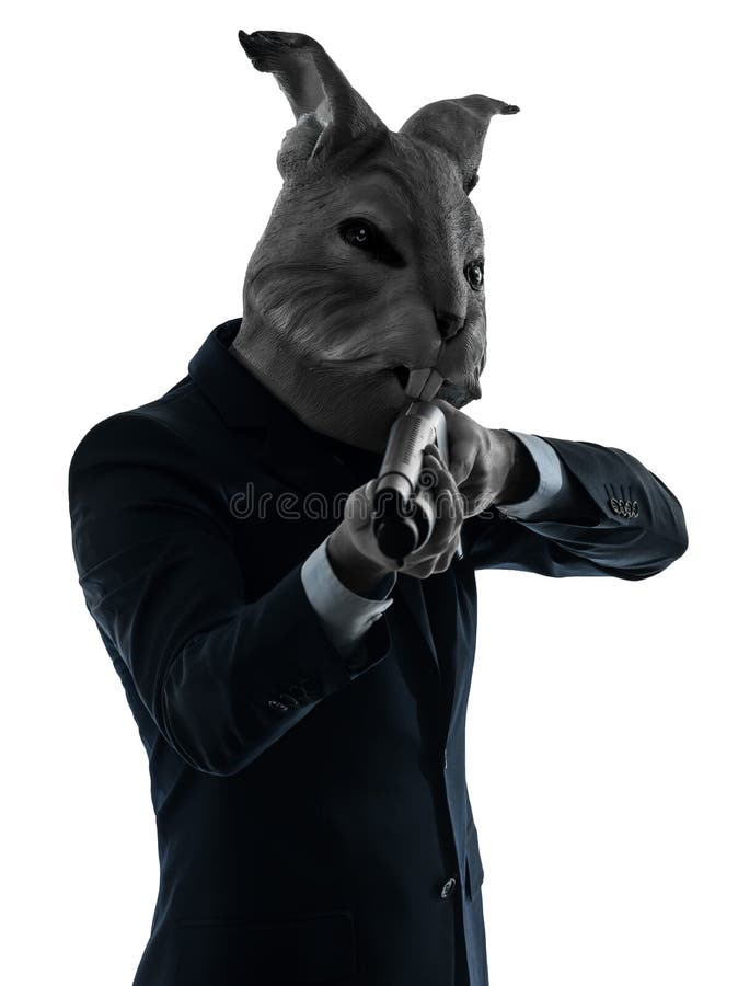 Man with rabbit mask hunting with shotgun silhouette portrait stock image Man with rabbit mask hunting with shotgun silhouette portrait stock image