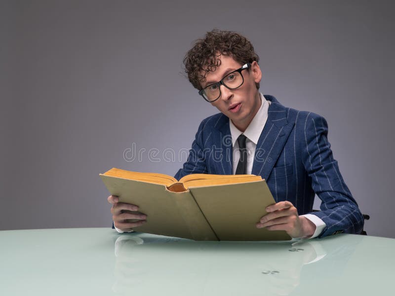 Funny man reading a book stock image. Image of model - 119113485 Funny man reading a book stock image. Image of model - 119113485