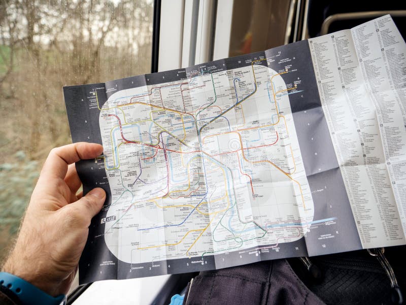 Man Reading In Fast Rer Train Map Of Parisian Metro Editorial Photography Image Of City France 147977502