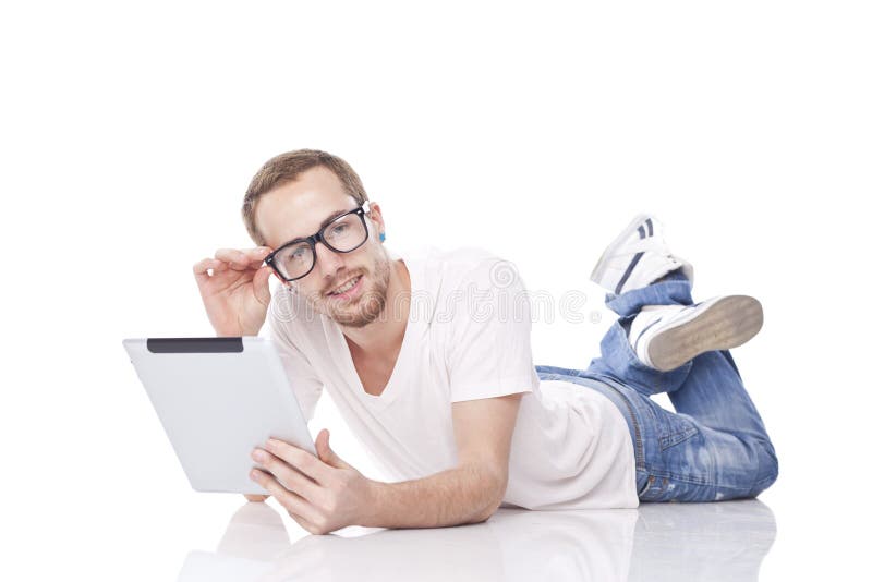 Man Reading News On Tablet Computer