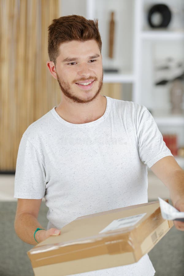 Man receiving parcel stock image. Image of speaking - 258798717