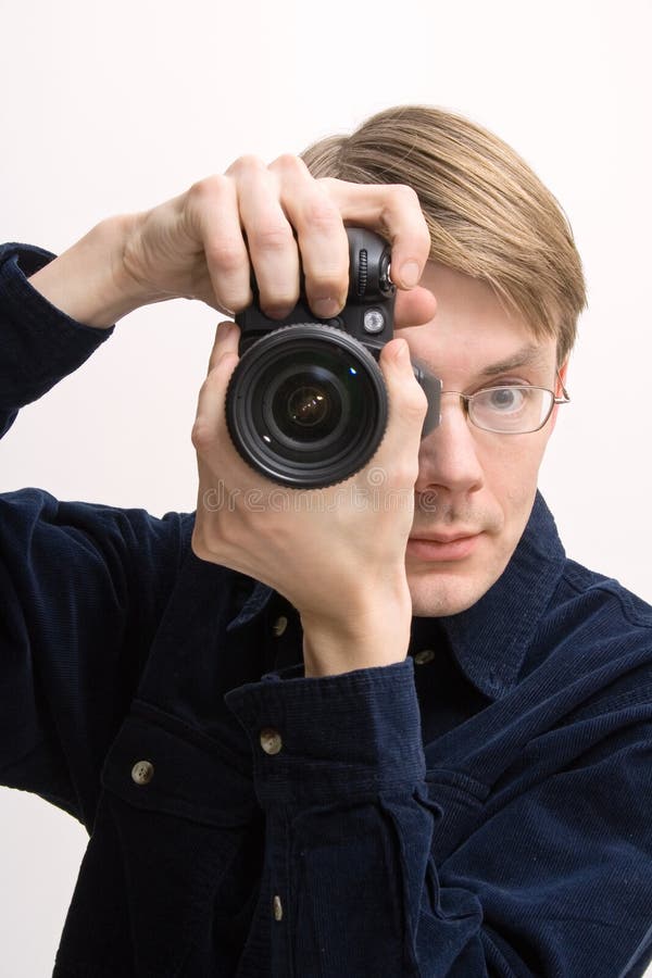 Man with reflex camera