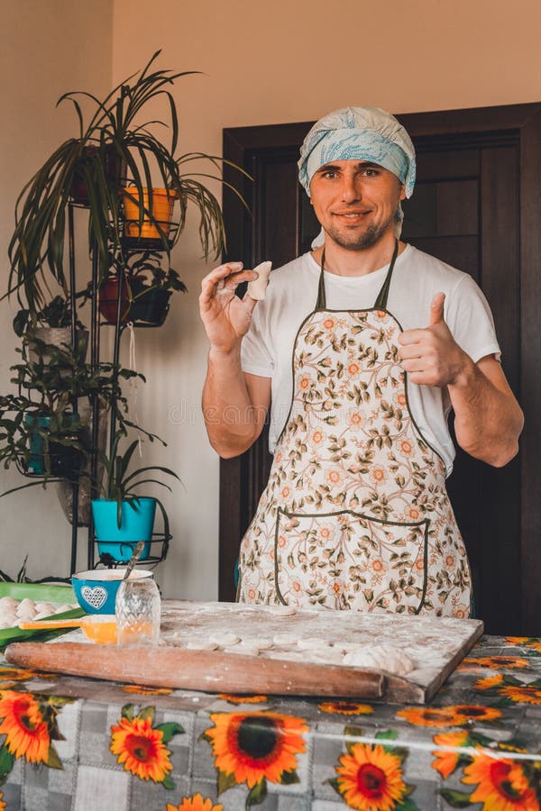 The man rejoices. for the first time properly cooked raw dumpling. 2020