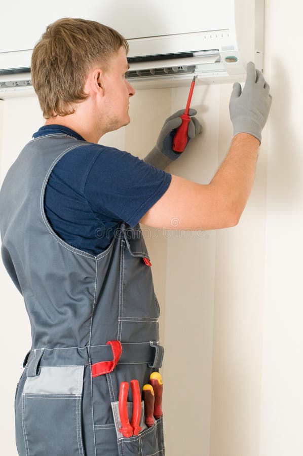 Man repair airconditioner stock image. Image of working 12204213