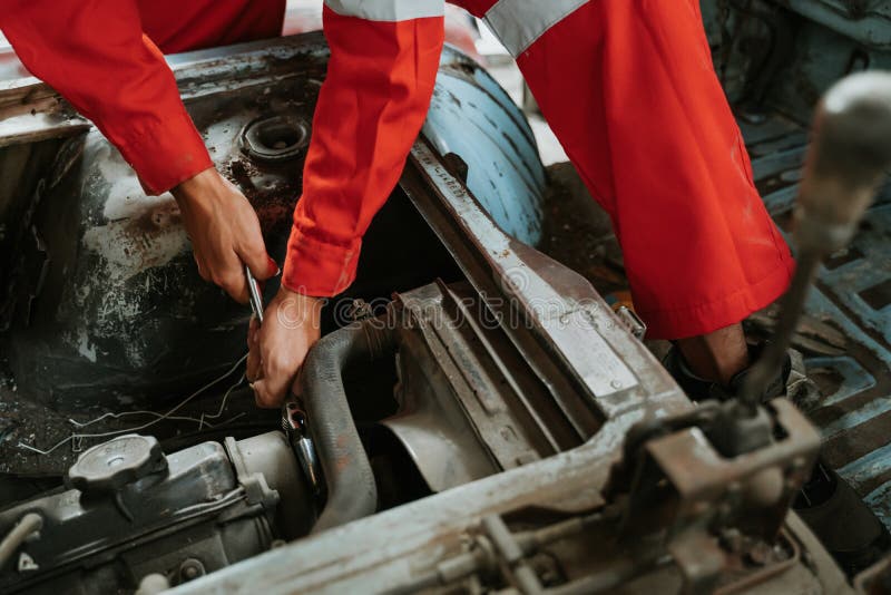 Man Repairing a Broken Car Engine Part Stock Image Image of