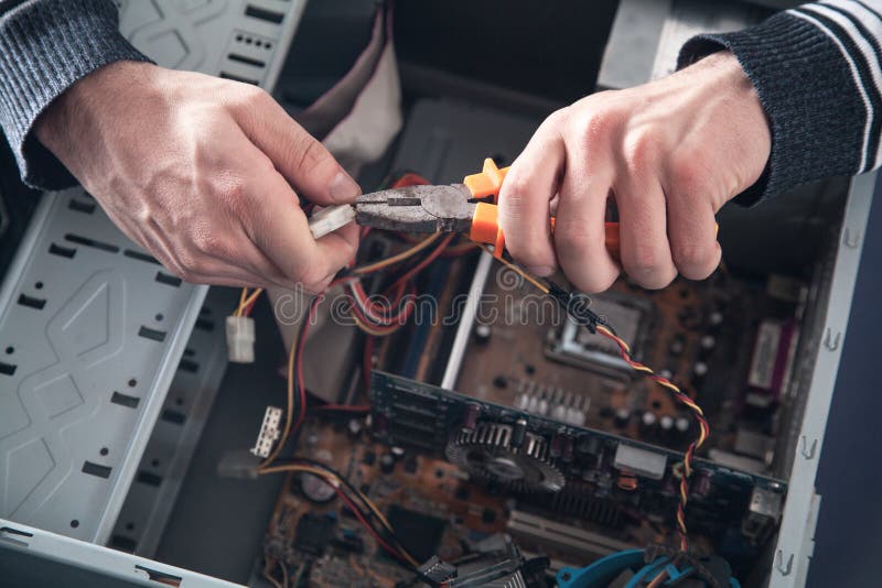 Man repairs computer stock image. Image of cables, working 9041237