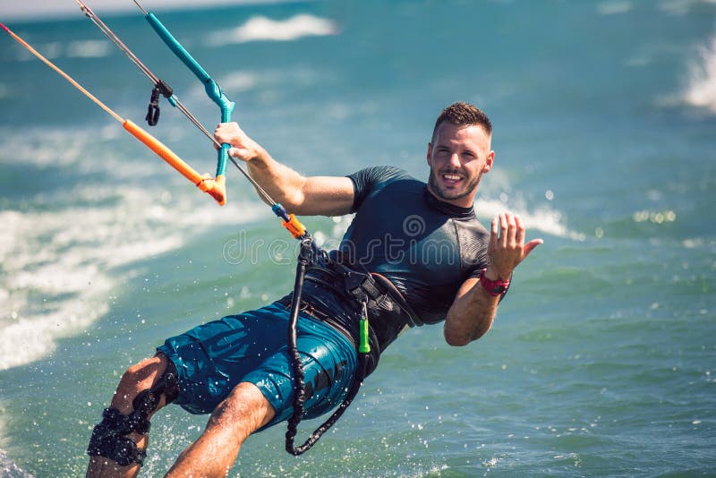 Man rides on kite on waves royalty free stock photos Man rides on kite on waves royalty free stock photos