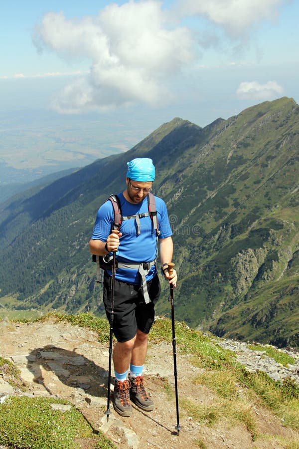 Man trekking in the mountains - in Fagaras Mountains. Rea trail stock images, royalty-free photos and pictures