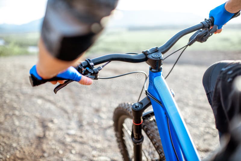 Man riding bicycle, close-up royalty free stock photography Man riding bicycle, close-up royalty free stock photography