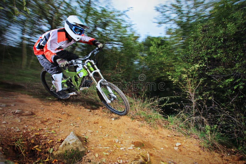 Man Riding a Mountain Bike Downhill Style Stock Photo Image of