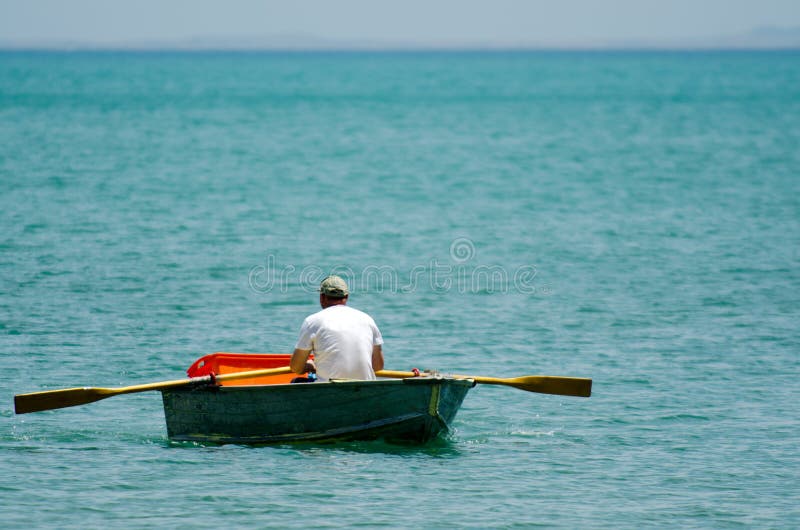 Man row dinghy stock photo. Image of leisure, dinghy 