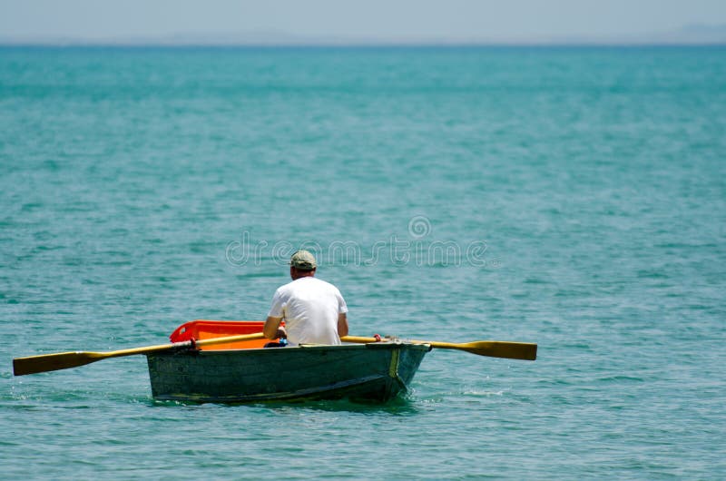 Man Row Dinghy Stock Photo - Image: 35561090