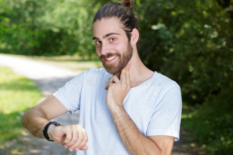 Man Runner Checking Heart Rate Stock Photo Image of check, person