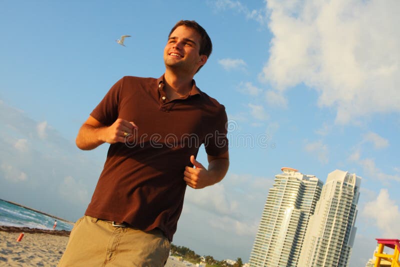 Man Running on the Beach