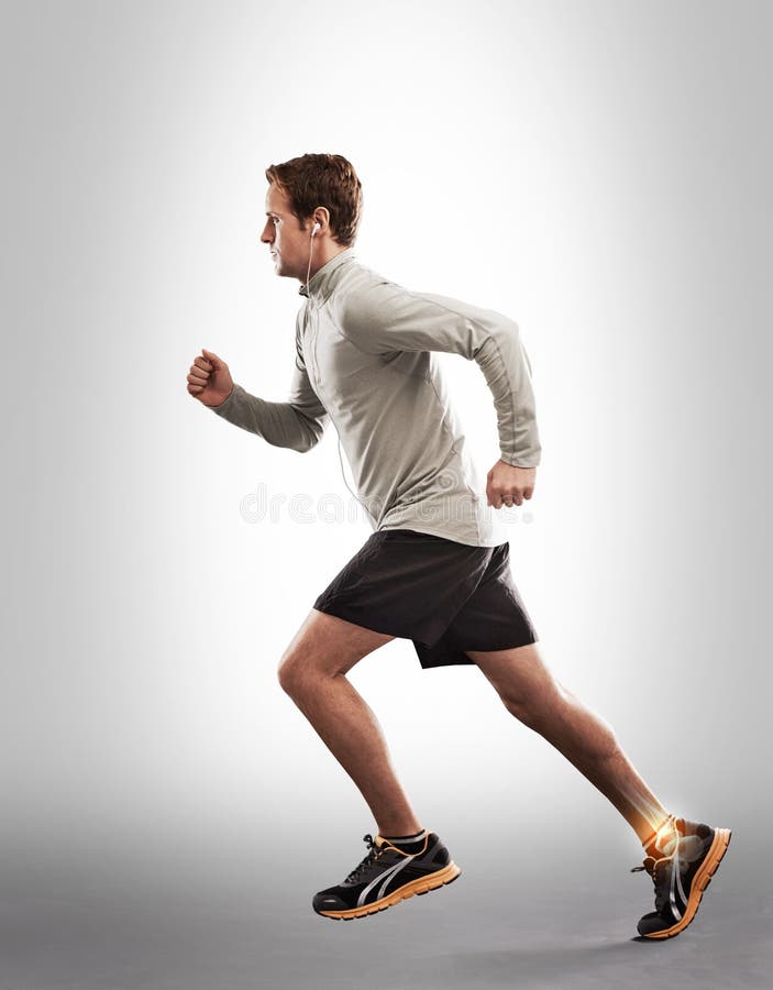 Man running, fitness and ankle pain with overlay, exercise injury and medical emergency on studio background. X ray