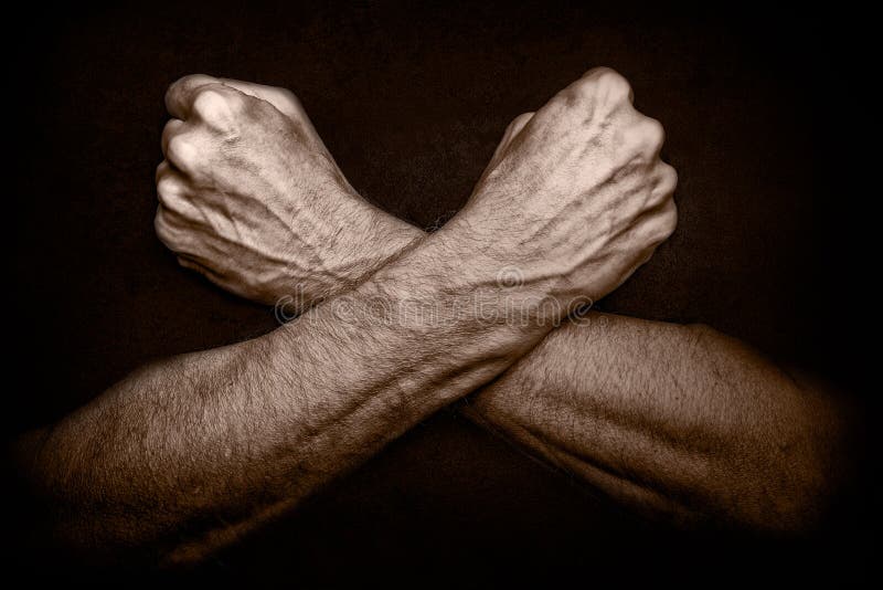 Man with crossed arms on Dark Background