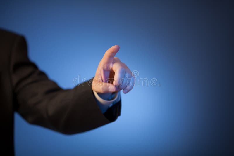Man's finger pressing invisible button royalty free stock photo