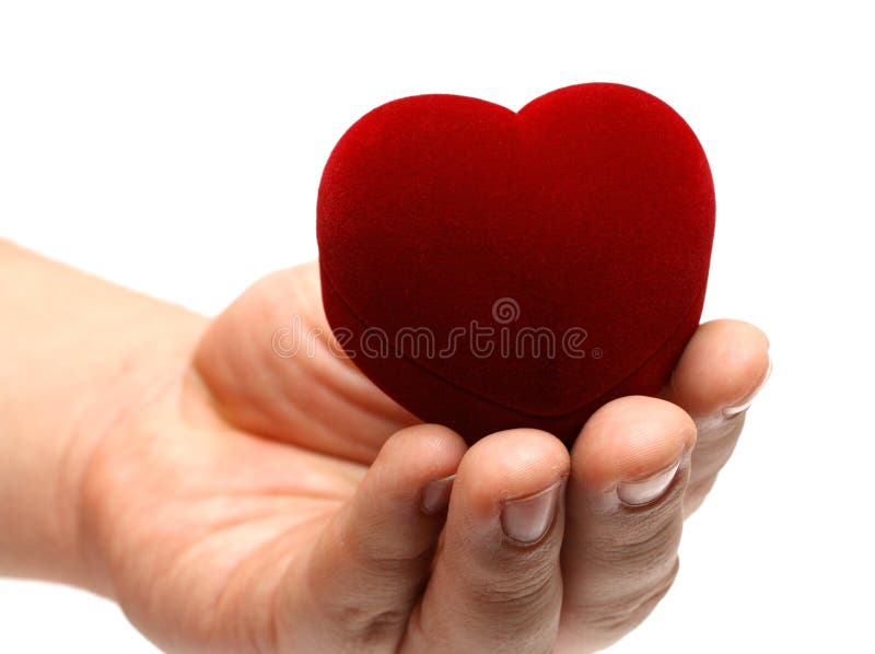 Man s hand gifting heart