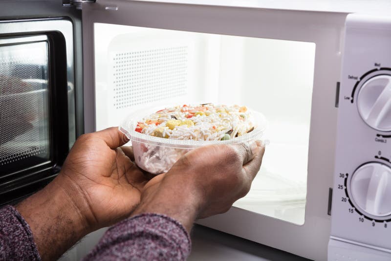 Heating Food in a Microwave Oven Stock Photo - Image of kitchen, door:  236057510