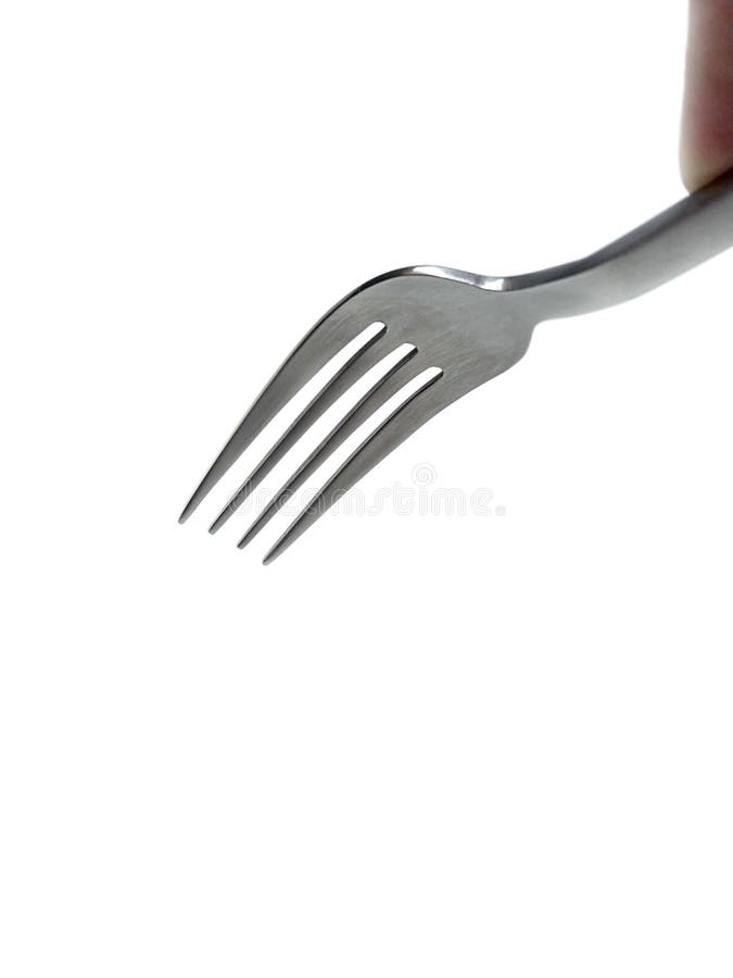 A man`s hand holding an empty silver fork on white background stock image